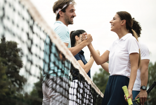 man and woman shaking hands